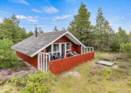 Beschauliches Holzhaus mit geschlossener Terrasse