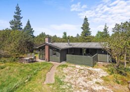 Traditionelles Holzhaus mit Sauna