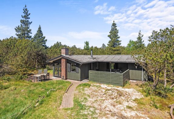 Traditionelles Holzhaus mit Sauna