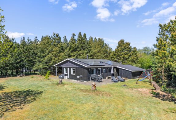 Gemütliches Holzhaus mit überdachter Terrasse