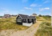 Herligt sommerhus med lukket terrasse nær stranden (billede 1)