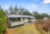 Klassisk sommerhus med brændeovn og lukket terrasse (billede 1)