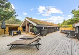 Hyggeligt træhus i idylliske omgivelser