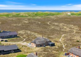 Strandnahes Reetdachhaus mit Sauna und Whirlpool