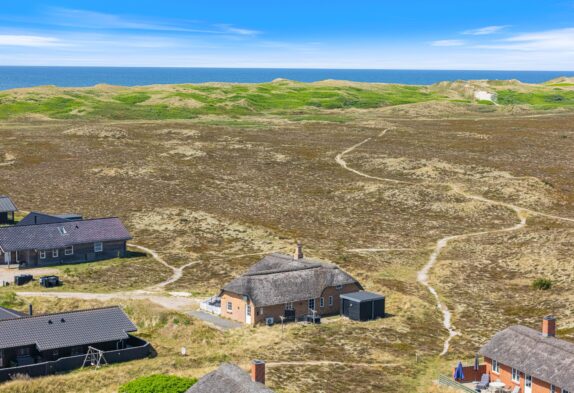 Strandnahes Reetdachhaus mit Sauna und Whirlpool