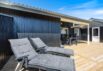 Træsommerhus med skønne terrasser og carport, tæt på havet (billede 29)