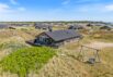 Strandnært sommerhus med brændeovn og lukket terrasse (billede 1)