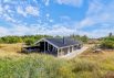 Et dejligt sommerhus i Bjerregård med brændeovn og sauna (billede 1)