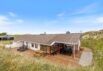 Strandnahes Ferienhaus mit gemütlicher Terrasse in Bjerregård (Bild  1)