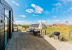 Hyggeligt sommerhus med skøn overdækket træterrasse og udsigt til klitterne (billede 39)