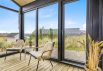 Hyggeligt sommerhus med skøn overdækket træterrasse og udsigt til klitterne (billede 30)
