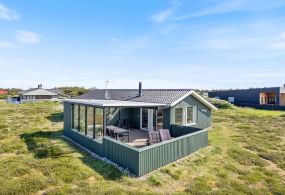 Feriehus med panoramaudsigt, tæt på havet og midt i klit-landskabet