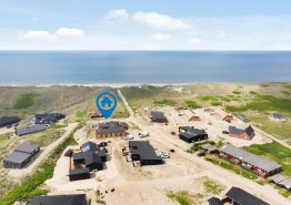 Luksuriøst sommerhus med udendørs spa og udesauna i Bjerregård