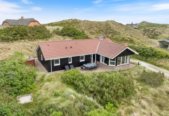 Strandnahes Ferienhaus auf schönem Dünengrundstück