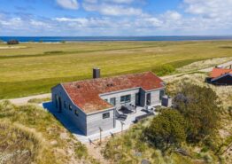 Femstjernet feriehus med New Yorker gulve og panorama udsigt