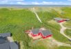 Charmantes Ferienhaus mit Kamin in direkter Strandlage – Årgab (Bild  1)