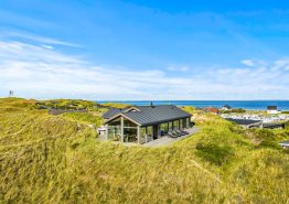 Luksussommerhus i Årgab med unik beliggenhed, udespa og sauna