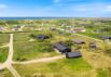 Feriehus med fredelig overdækket terrasse nær stranden (billede 1)