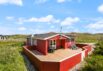 Feriehus med dejlig terrasse på naturgrund 300 fra stranden (billede 1)