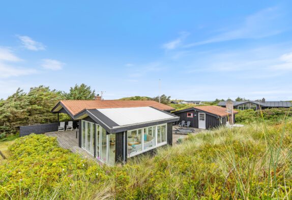 Schönes Ferienhaus mit Sauna und Wintergarten und nur 150 m von der Küste