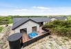 Strandnært luksussommerhus med udespa, sauna og aktivitetsrum (billede 44)