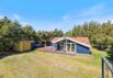 Stilrent sommerhus i Nr. Lyngvig med udendørs sauna og spa (billede 1)