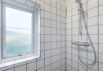 Hus på lyngklædt grund med lukket terrasse og carport (billede 13)