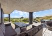 Moderne sommerhus med udendørs bruser og smuk udsigt til hav og fjord (billede 24)