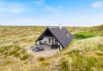 Skønt beliggende sommerhus med udsigt ud over klitlandskabet (billede 1)