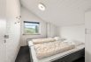 Hus på lyngklædt grund med lukket terrasse og carport (billede 11)