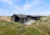 Flot feriehus med panoramaudsigt og sauna kun 250 m fra stranden (billede 1)