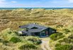 Flot feriehus med panoramaudsigt og sauna kun 250 m fra stranden (billede 1)