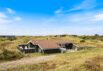 Hyggeligt sommerhus med overdækket terrasse på klitgrund (billede 1)