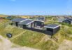 Lyst og venligt sommerhus med udendørs bruser og 250m til havet (billede 1)