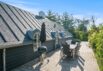 Lyst og velholdt træsommerhus med spabad i Houvig (billede 32)