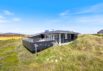 Dejligt sommerhus med moderne indretning og udsigt til klitterne (billede 26)
