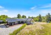 Skønt feriehus med aktivitetrum beliggende på stor naturgrund (billede 1)