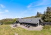 Stilfuldt sommerhus med sauna og gennemført indretning (billede 1)