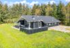 Firestjernet sommerhus i Lodbjerg Hede med spabad og sauna (billede 1)