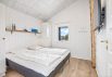 Stilfuldt sommerhus med spa, udebruser og panorama udsigt (billede 16)