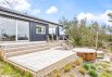 Stilfuldt sommerhus med spa, udebruser og panorama udsigt (billede 34)
