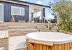 Stilfuldt sommerhus med spa, udebruser og panorama udsigt (billede 35)