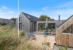 Firestjernet sommerhus med udebruser og lukket terrasse i Søndervig (billede 24)