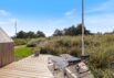 Firestjernet sommerhus med udebruser og lukket terrasse i Søndervig (billede 25)