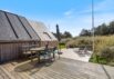 Firestjernet sommerhus med udebruser og lukket terrasse i Søndervig (billede 26)