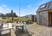 Firestjernet sommerhus med udebruser og lukket terrasse i Søndervig (billede 28)