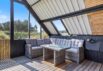 Firestjernet sommerhus med udebruser og lukket terrasse i Søndervig (billede 33)