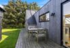 Firestjernet sommerhus med udebruser og lukket terrasse i Søndervig (billede 39)