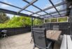 Velholdt sommerhus med overdækket terrasse i roligt område (billede 26)