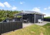 Velholdt sommerhus med overdækket terrasse i roligt område (billede 29)